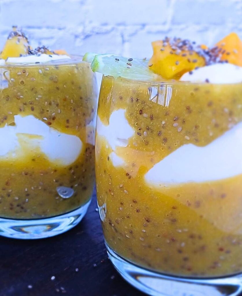 Mango chia seed pudding with lime in glass cups