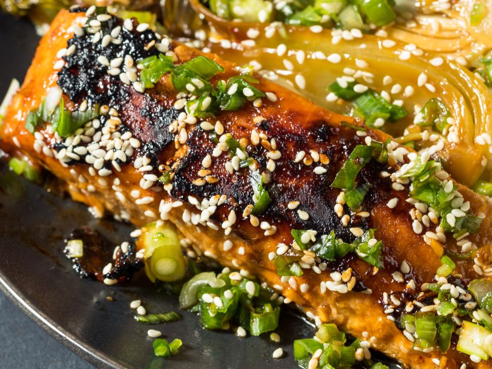 miso butter salmon with green onions and sesame seeds