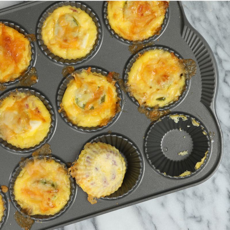 egg bites with cottage cheese baking on a tray