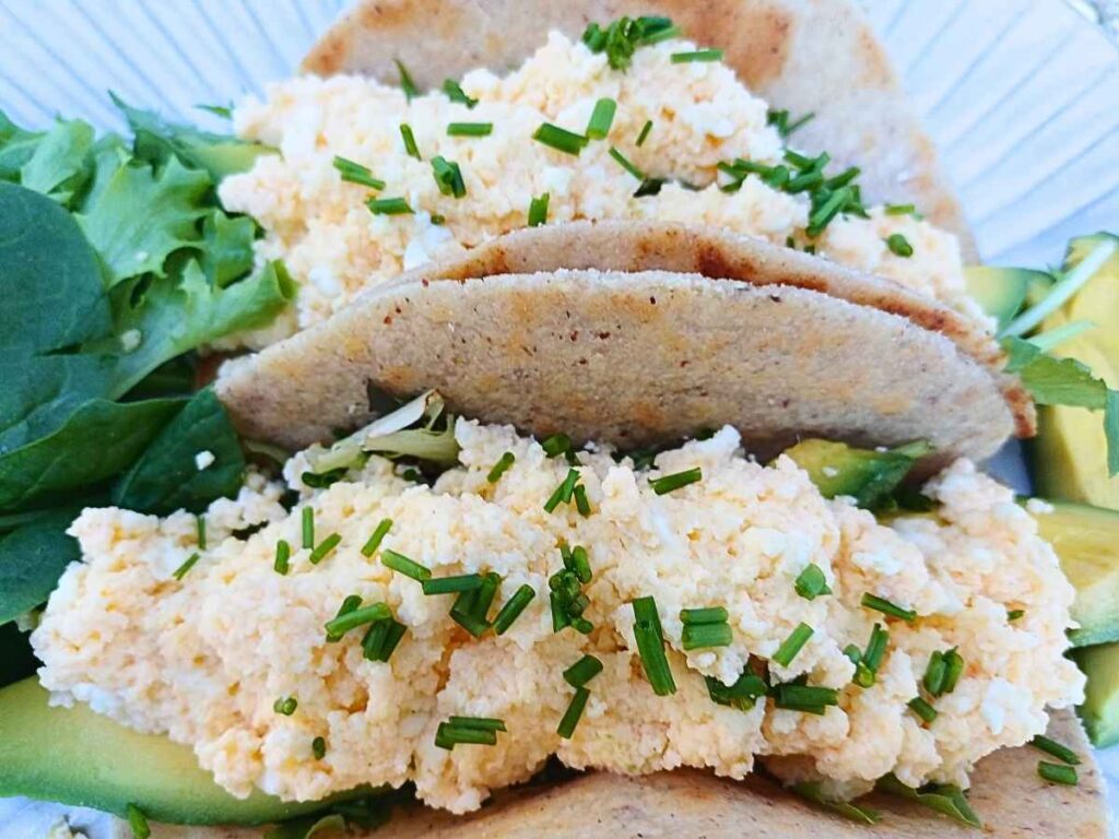 scrambled eggs with cottage cheese inside tortillas