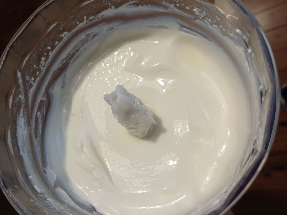 Blending cottage cheese in a blender.