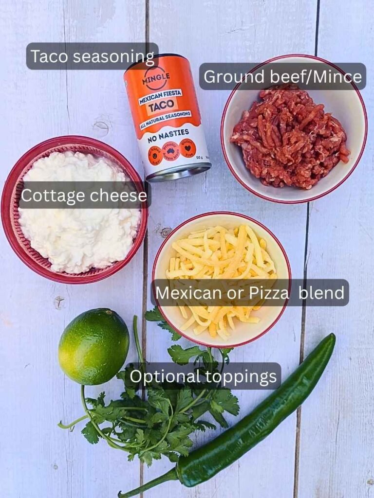 Ingredients for cottage cheese queso with ground beef layed out on a table