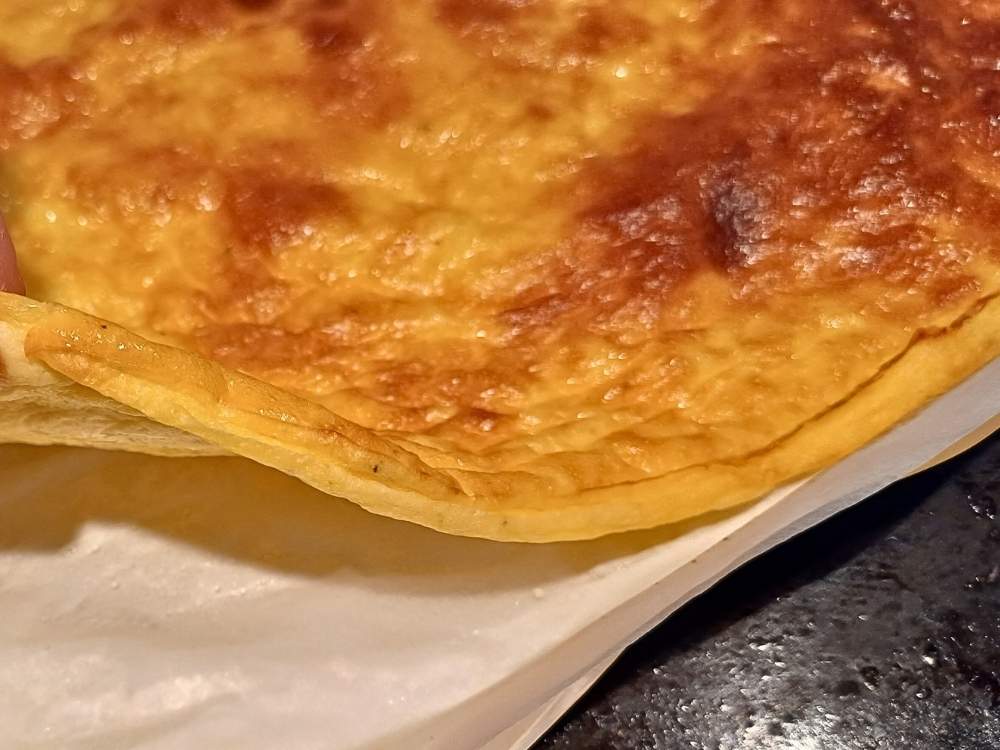 Cottage cheese flatbread on a baking sheet