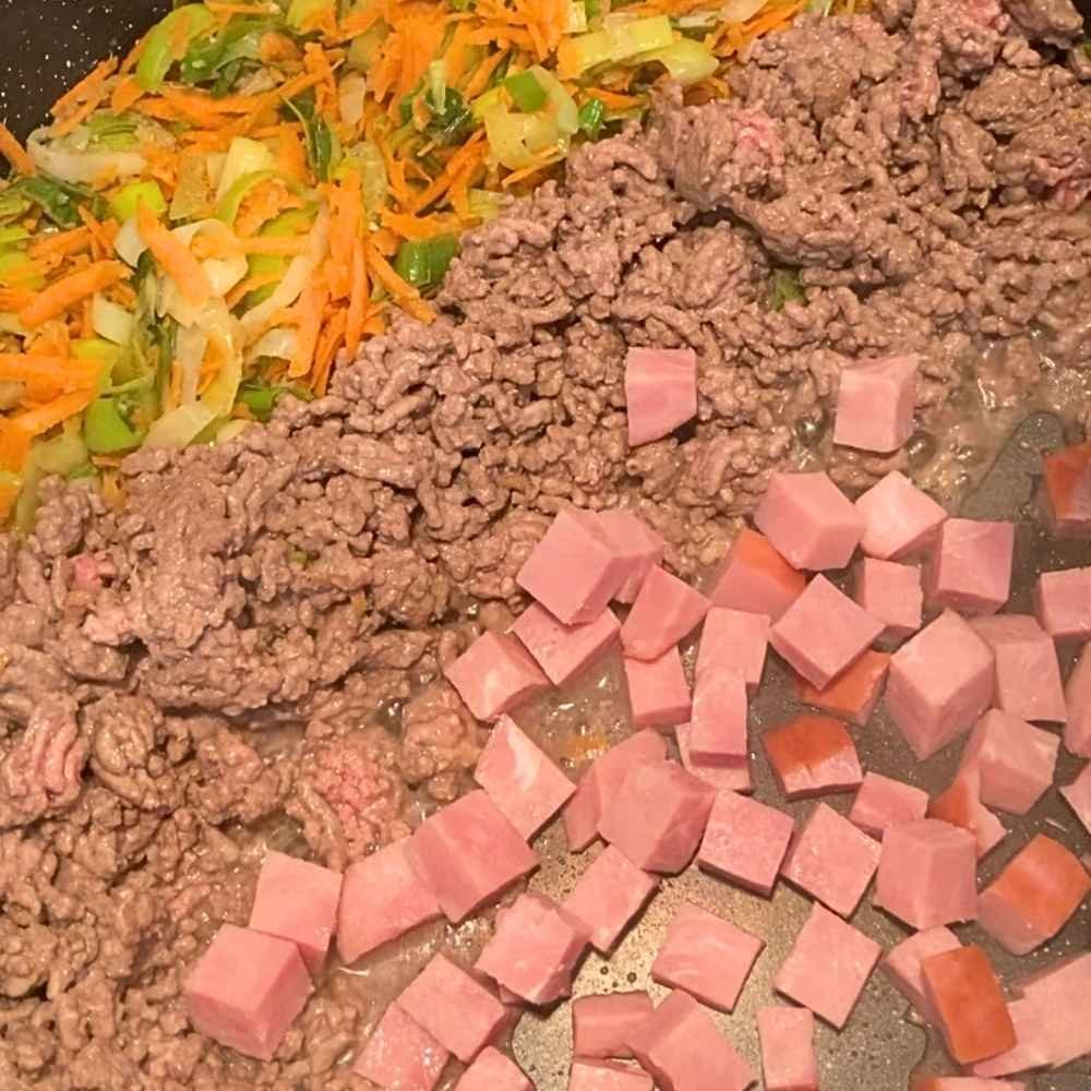 Adding ham to dirty cabbage casserole