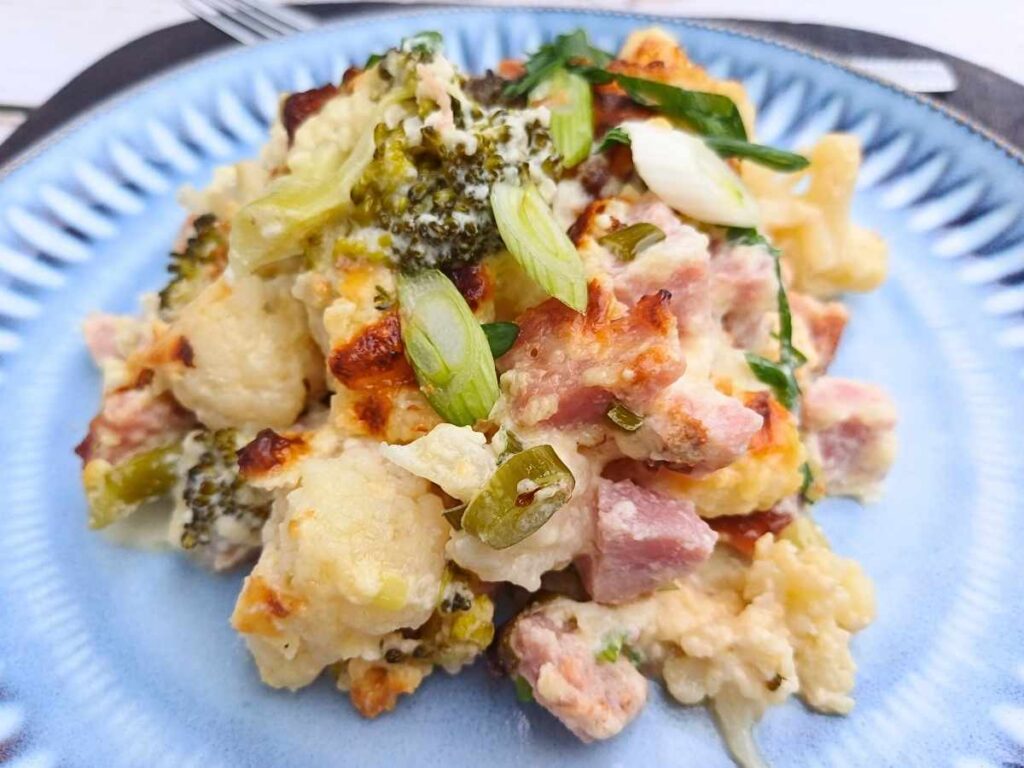 Close up of a creamy keto ham casserole with vegetables