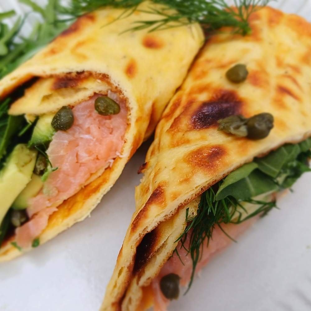 Cottage cheese flatbrad wraps with smoked salmon and salad