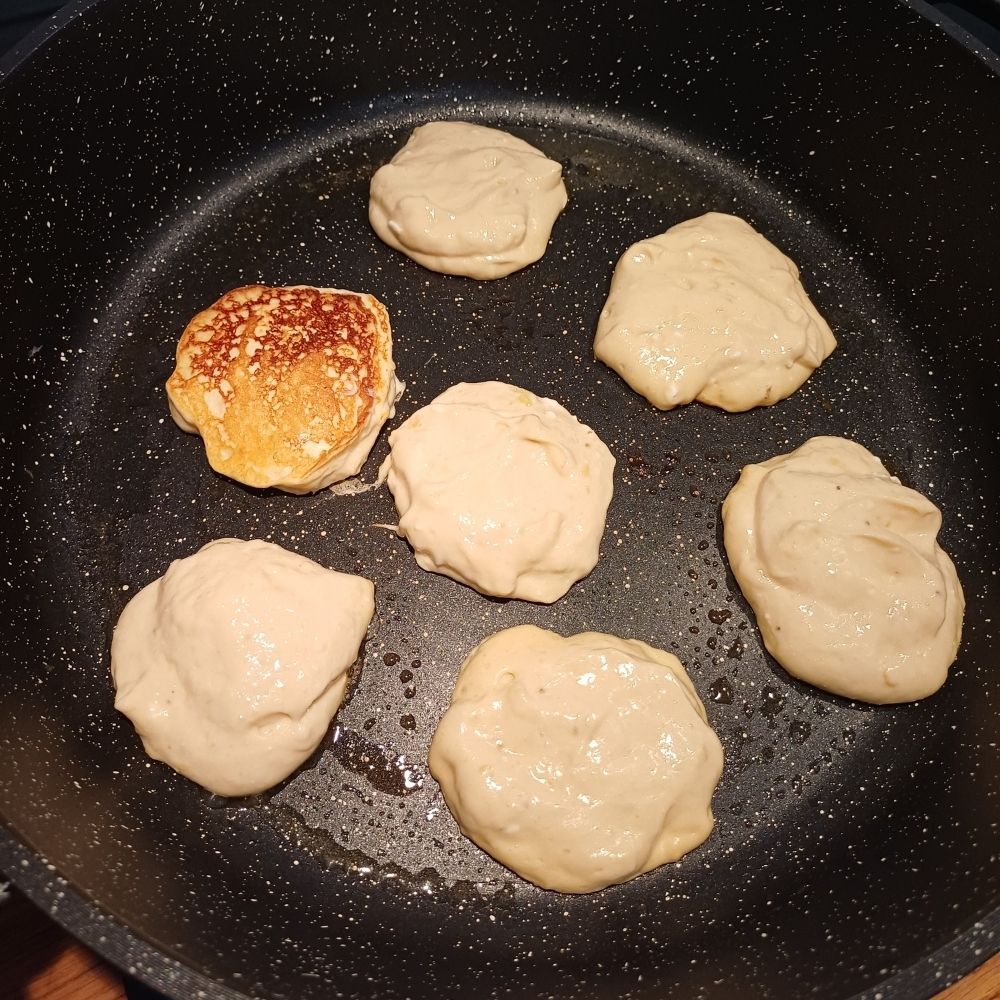 Cooking pancakes on a frying pan