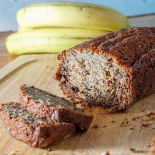 A loaf of freshly home made cottage cheese banana bread witha few sliced cut