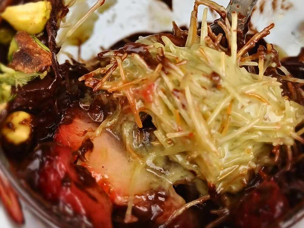 Close up view of Dubai chocolate strawberry cup recipe