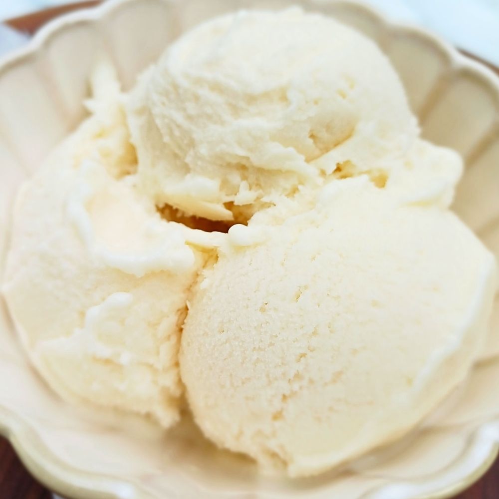 Scoops of vanilla ice cream in a bowl