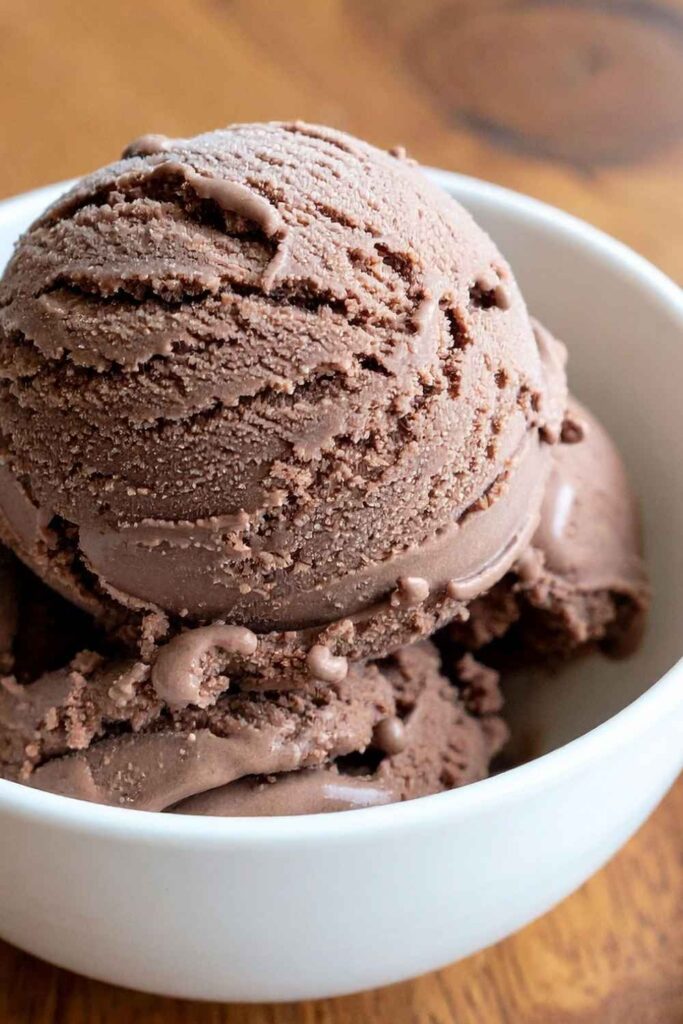 A close up of a scoop of creamy chocolate ice cream made with Ninja Creami machine