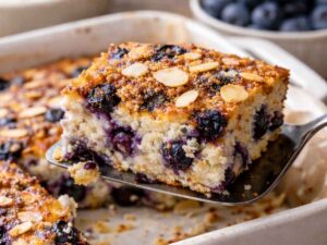 A slice of blueberry cottage cheese breakfast bake
