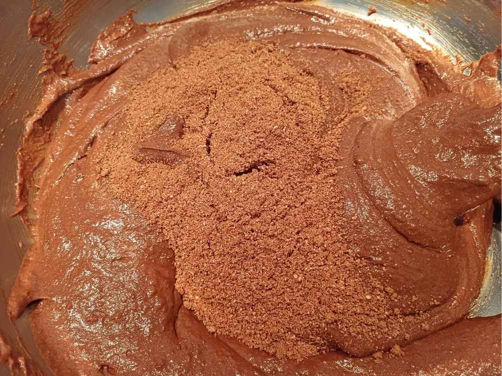 Dry ingredients added to wet for the chocolate cake batter