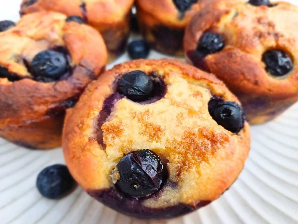 Almond flour blueberry muffins on a plate