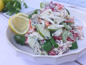 High protein chicken salad with yogurt dressing, quinoa and crunchy vegetables