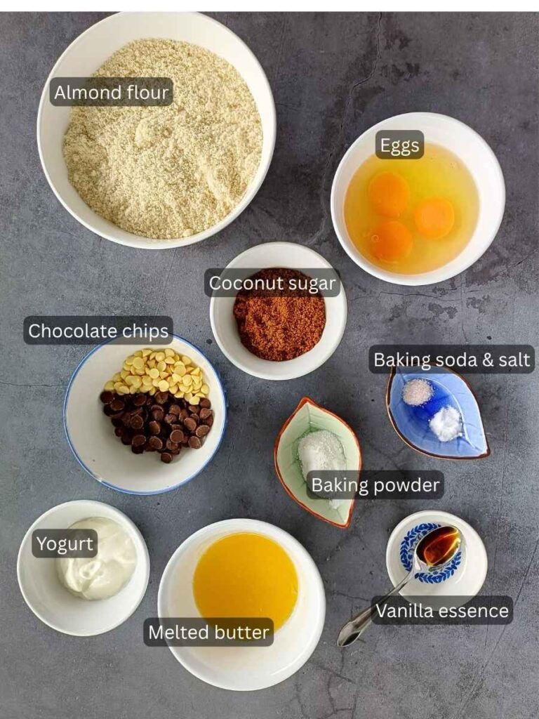 Ingredients for almond flour chocolate chip muffins in bowls