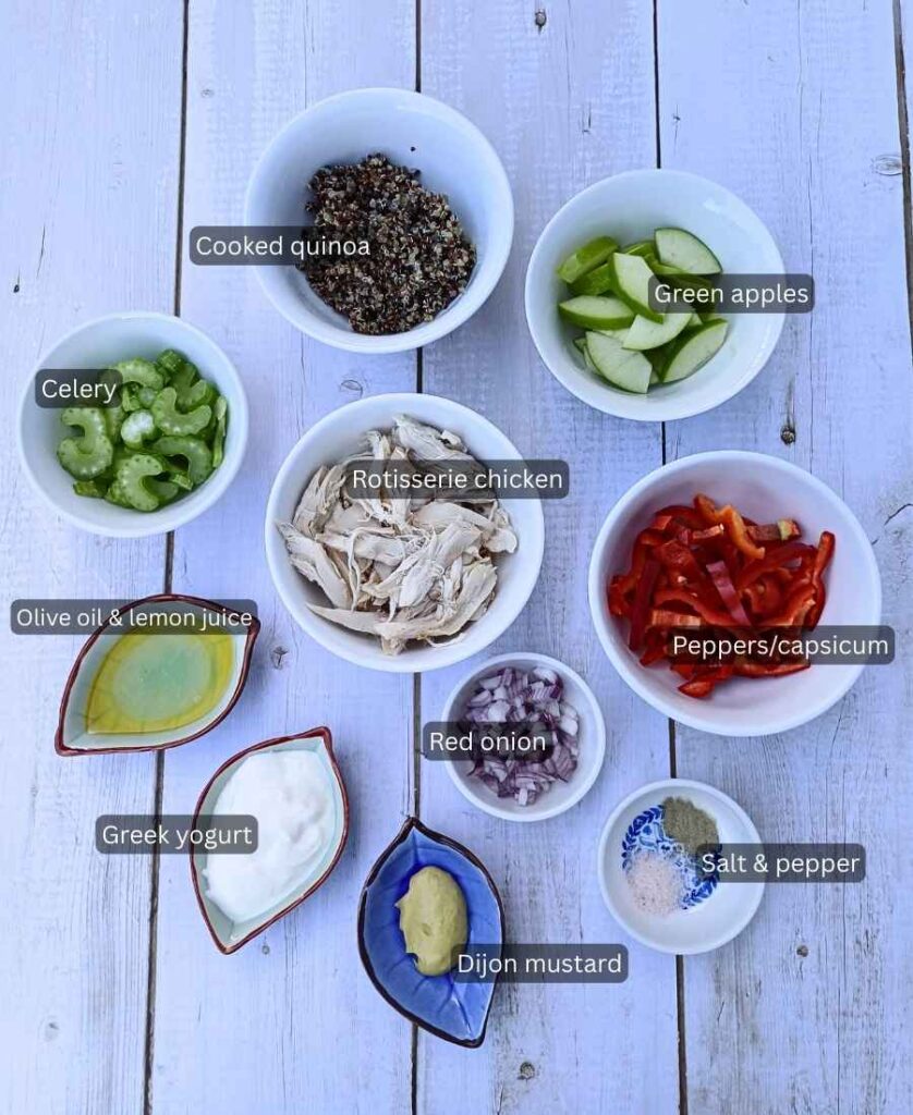 Bowls of labeled ingredients for high protein chicken salad