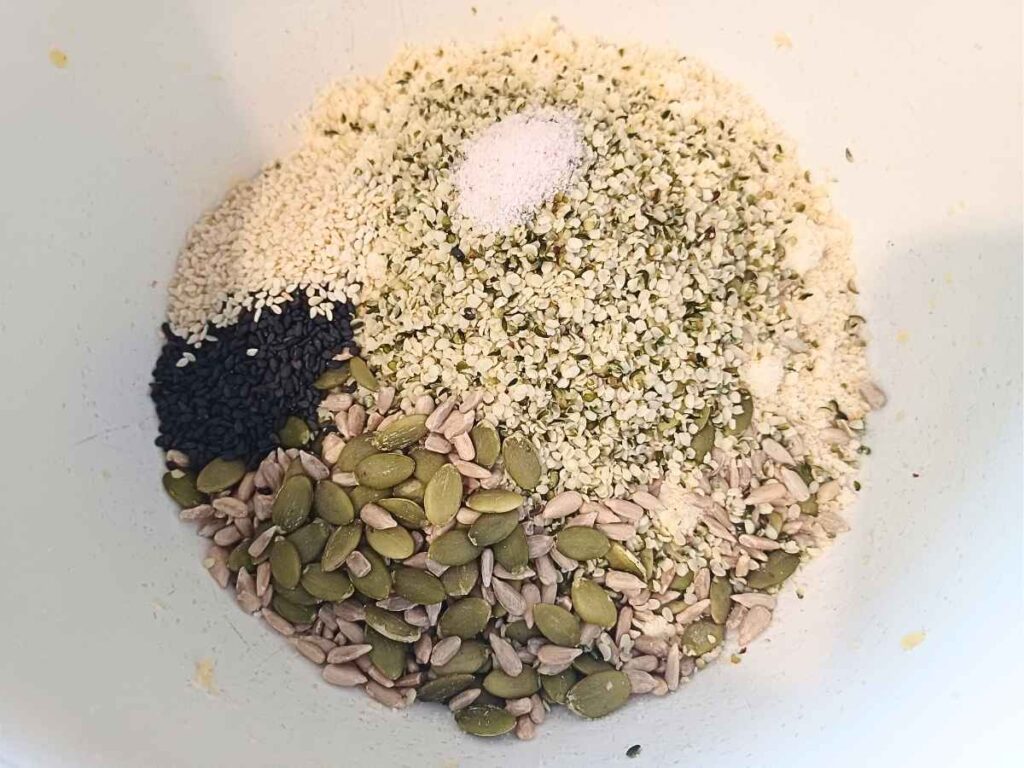 A bowl of almond flour and seeds