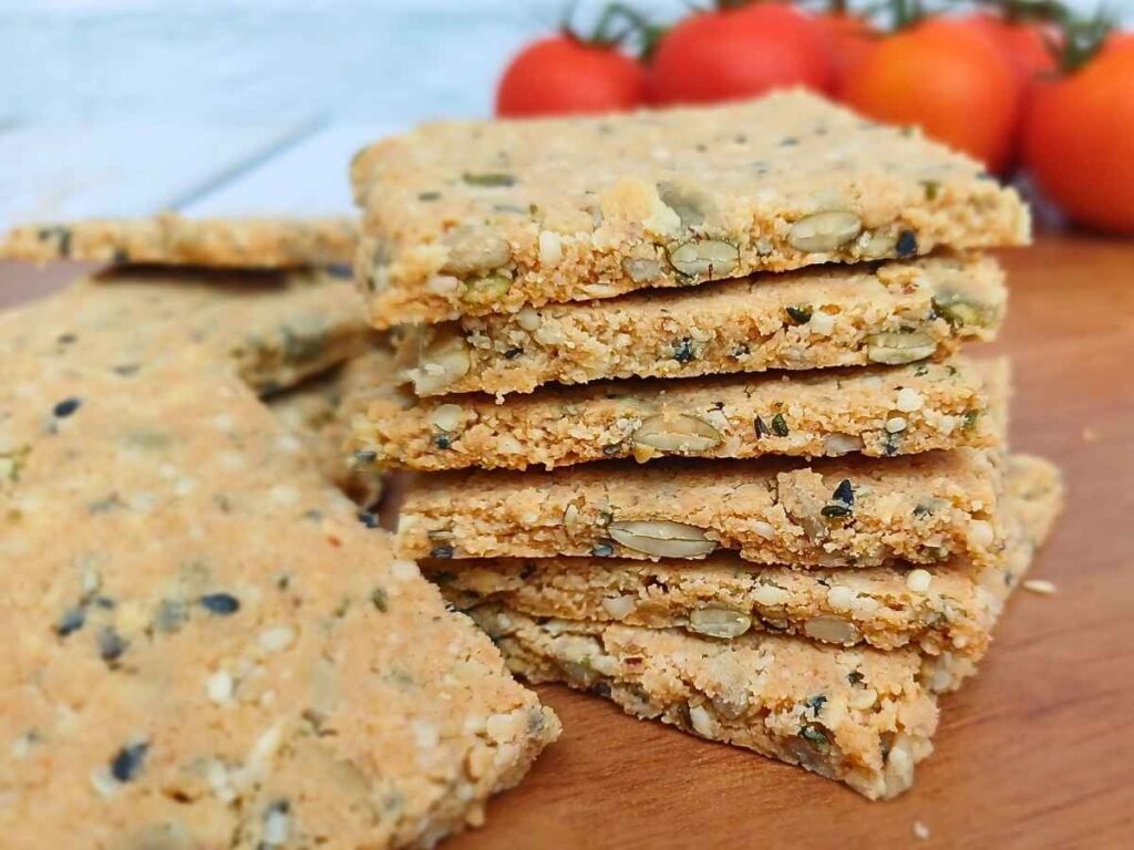 Stack of seeded almond flour crackers