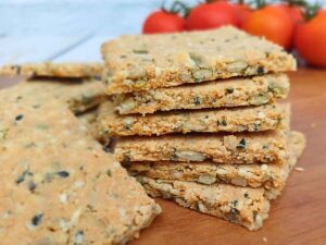 Stack of seeded almond flour crackers