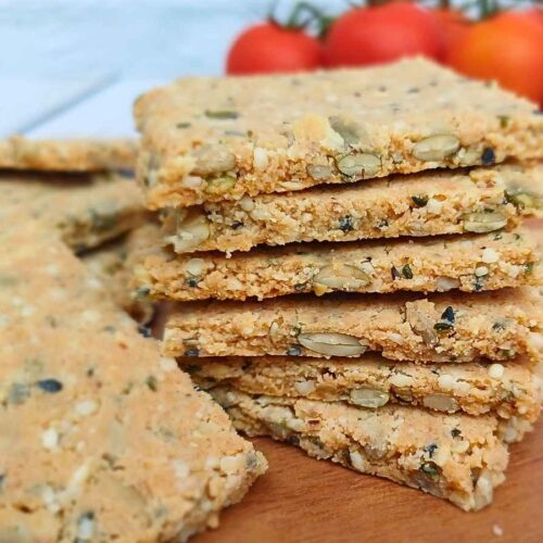 Stack of seeded almond flour crackers