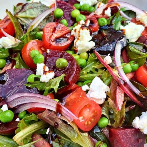 Beet salad with goat cheese, spring mix, green peas and cherry tomatos