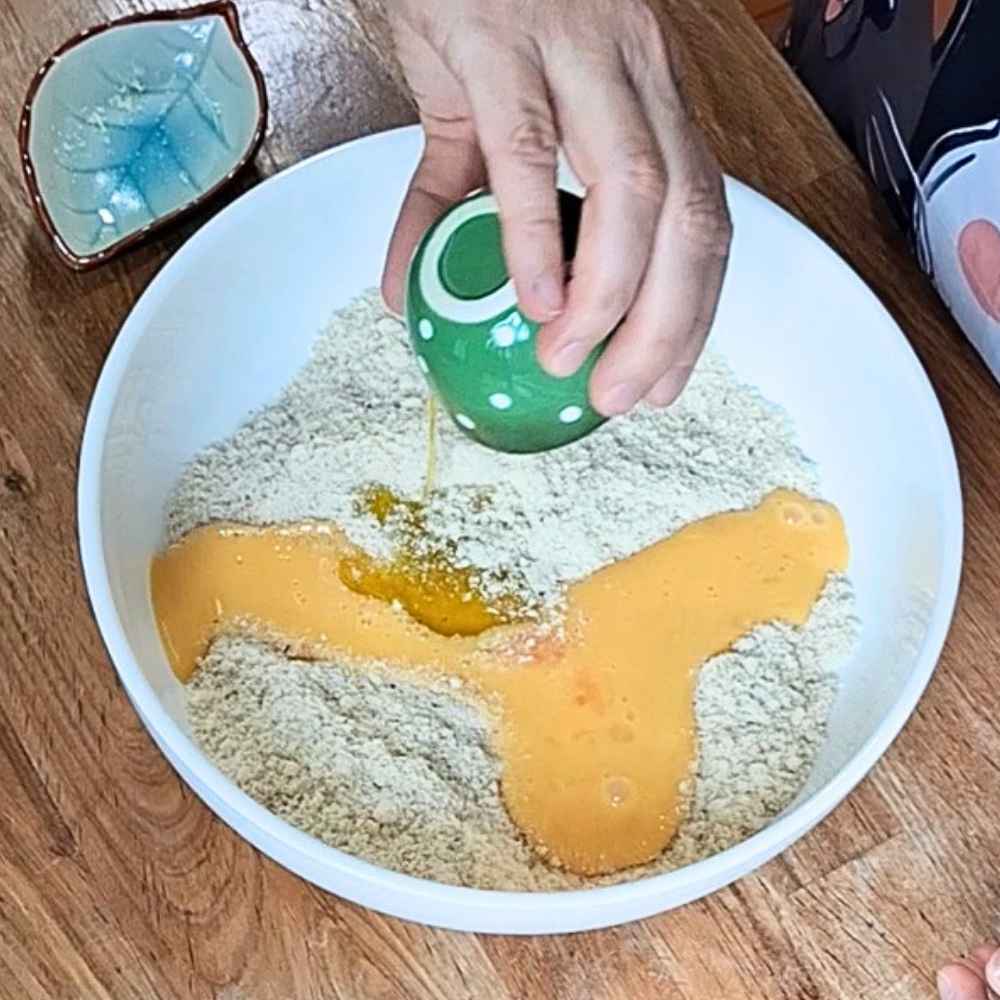 Adding eggs to almond flour