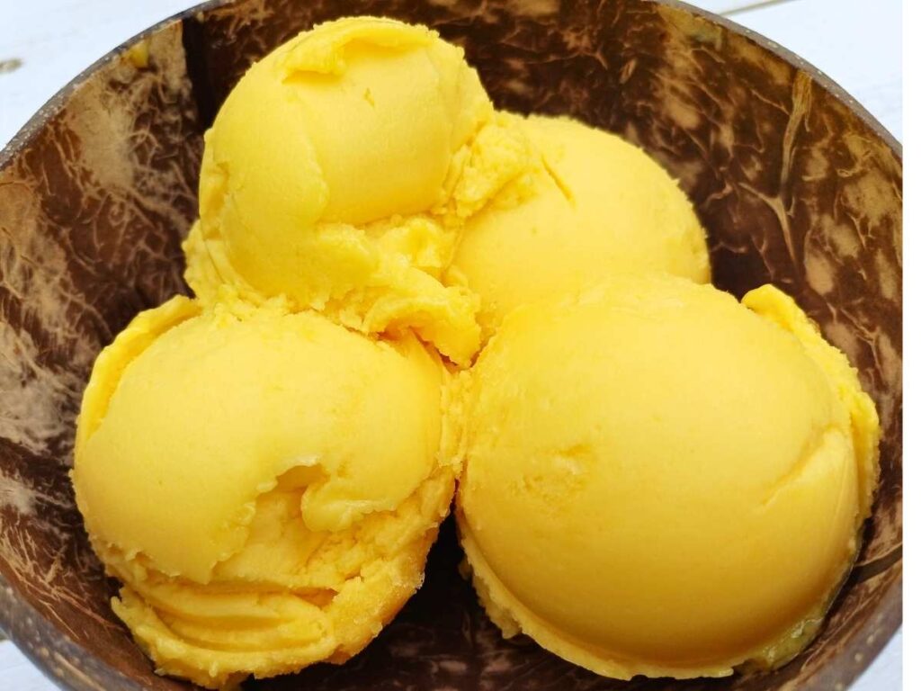 Scoops of mango sorbet made with Ninja Creami machine