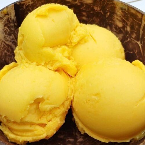 Scoops of mango sorbet made with Ninja Creami machine
