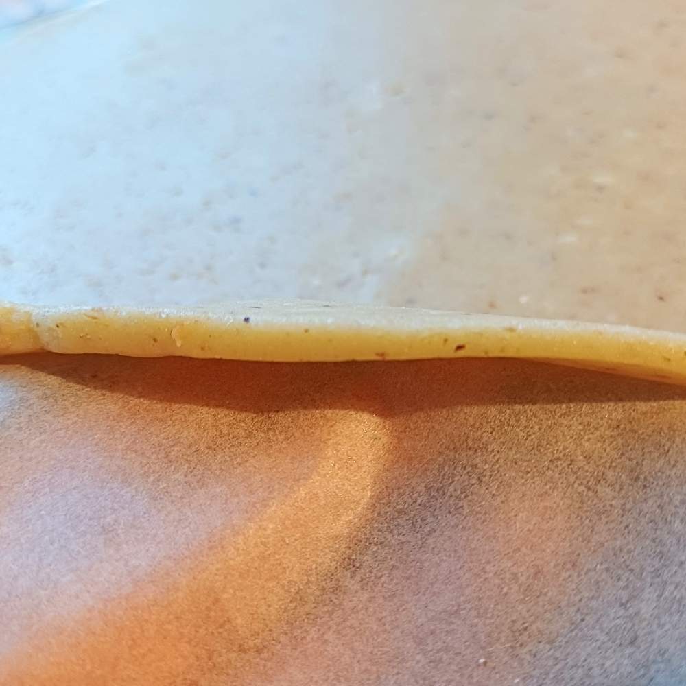 Thickness of almond flour pizza crust uncooked