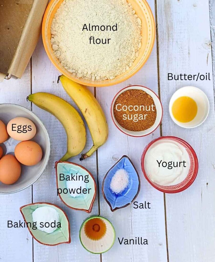 Ingredients for almond flour banana bread laid out on a bench