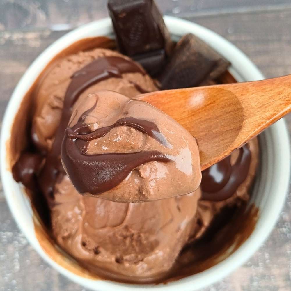 Spoonful of rich chocolate ice cream made with Ninja creami machine