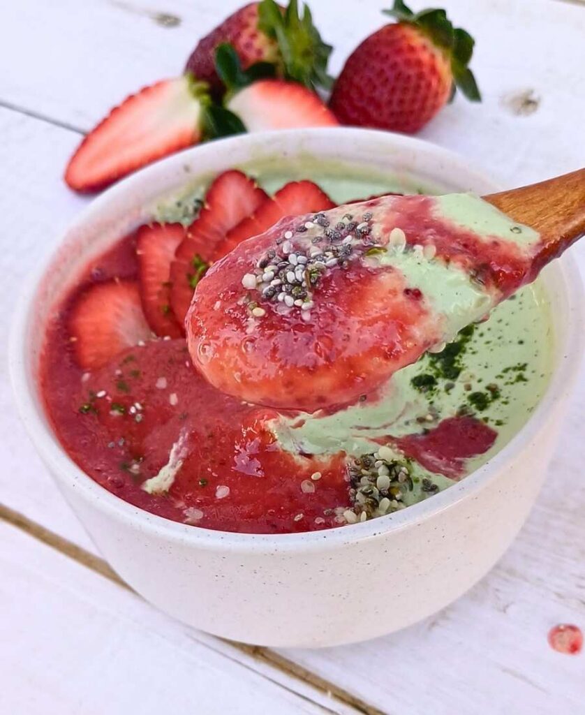 A spoonful of strawberry matcha smoothie bowl