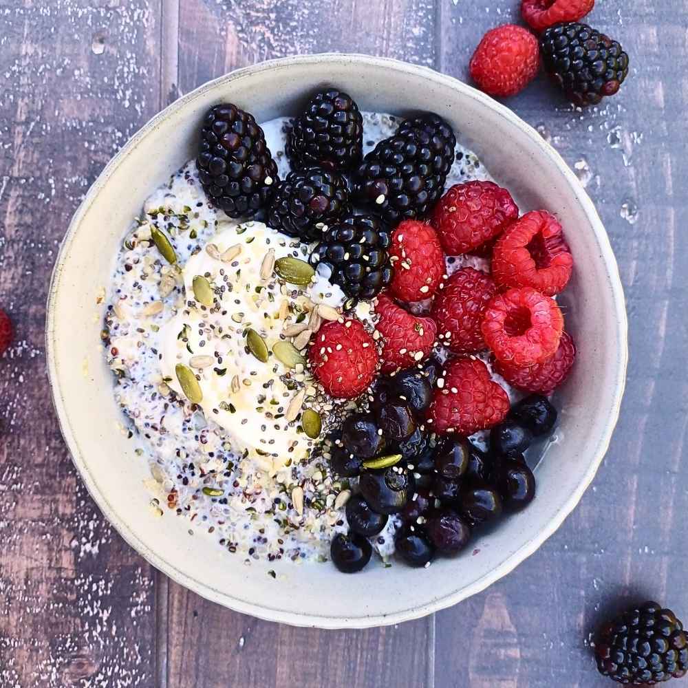 quinoa porridge with berries and seeds