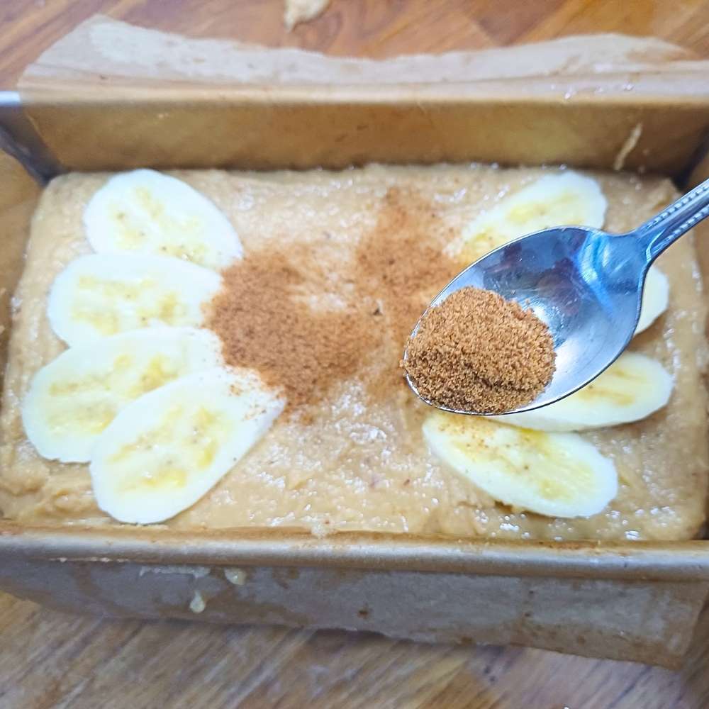 Unbaked banana bread loaf batter in loaf tin
