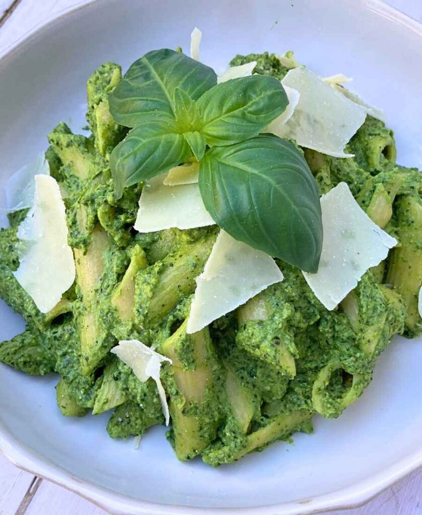 pasta with green cottage cheese pasta sauce and basil