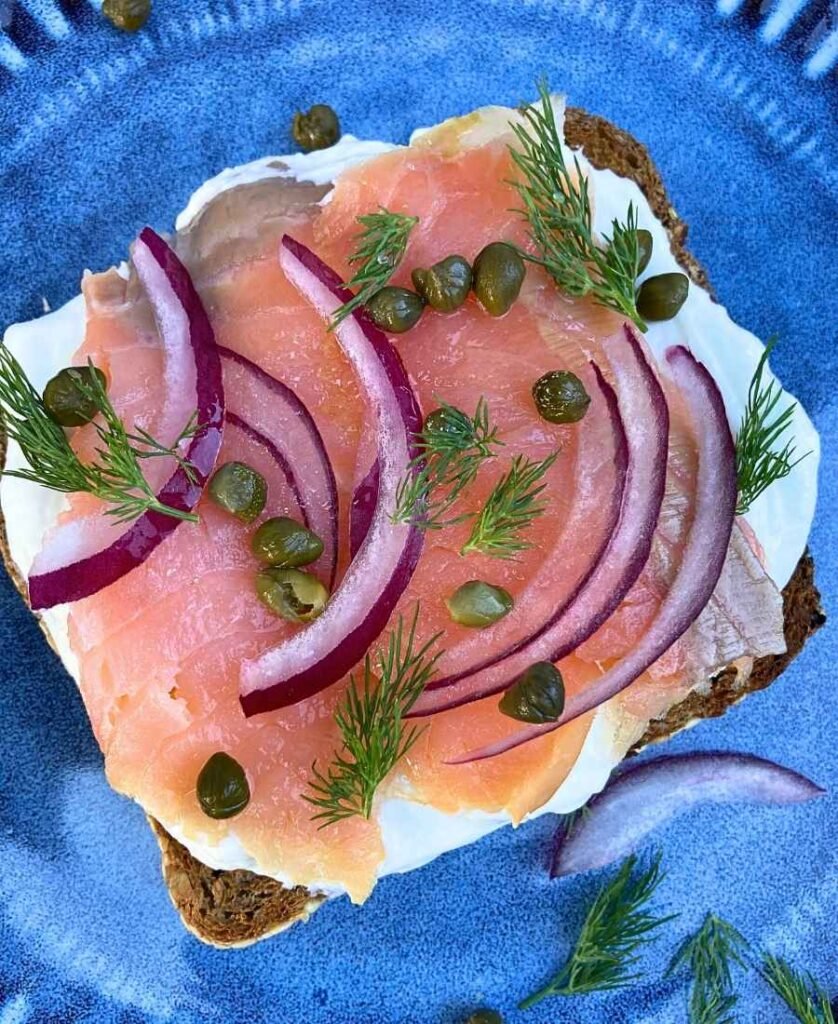 Smoked salmon cottage cheese toast with red onions and capers