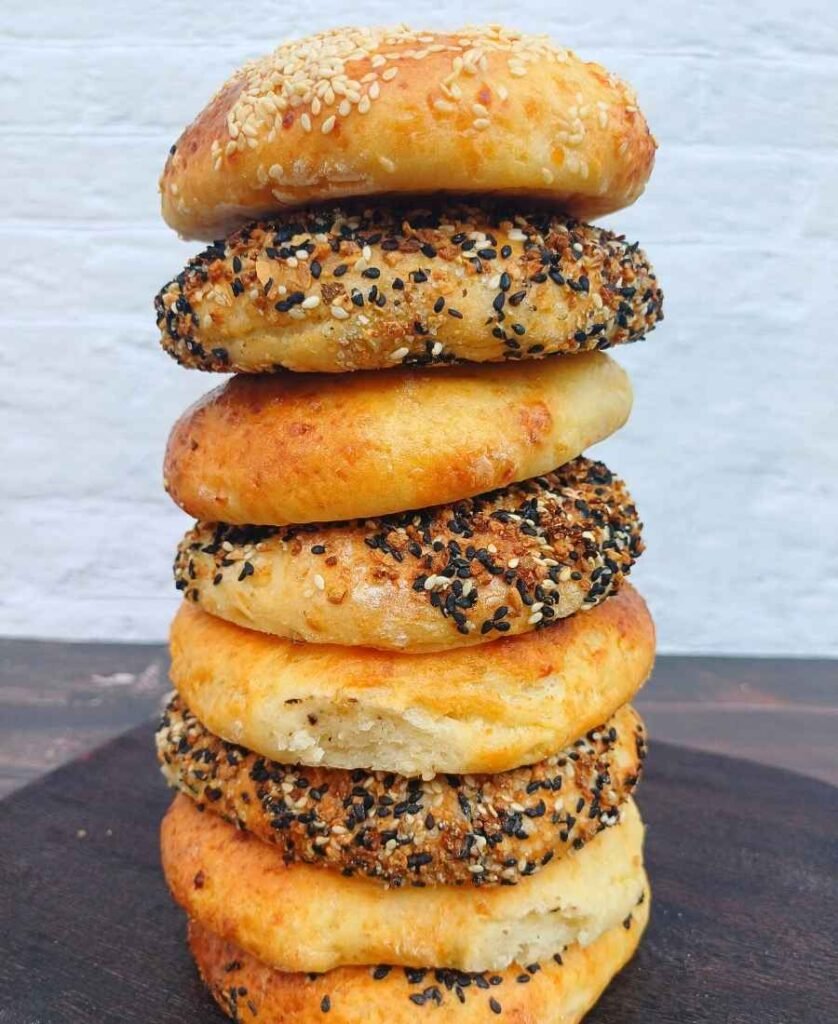 Tall stack of cottage cheese bagels